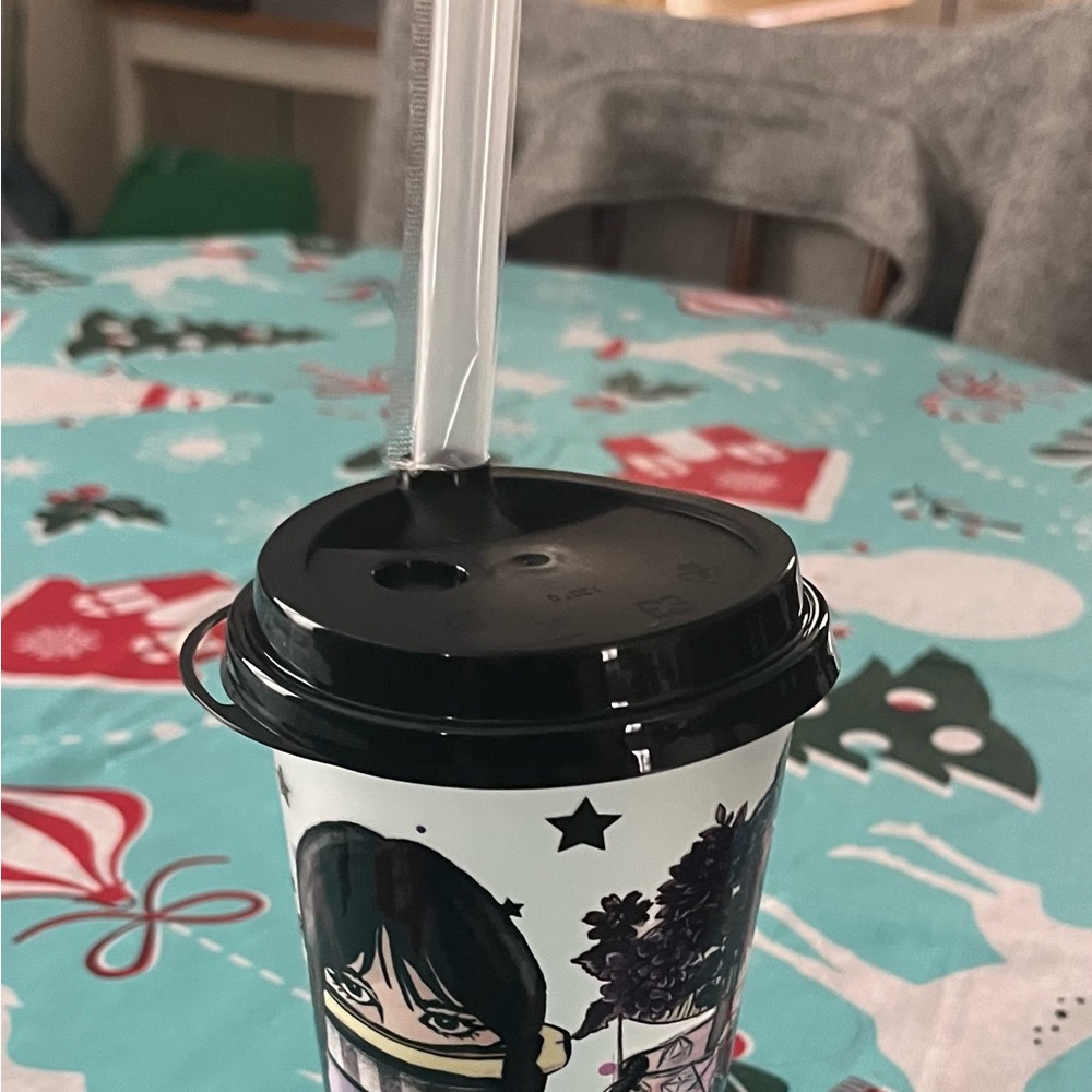 Stylish Black and White Coffee Cup with Straw
